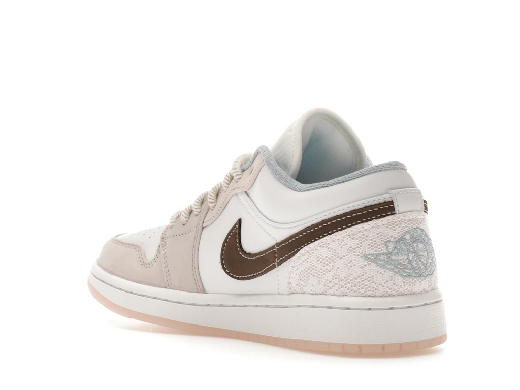 Jordan 1 Low Coral (W)
