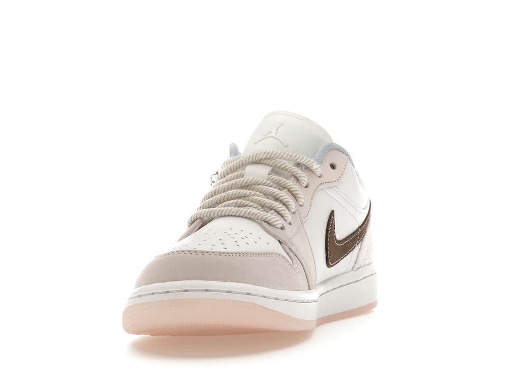Jordan 1 Low Coral (W)