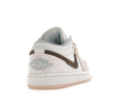 Jordan 1 Low Coral (W)
