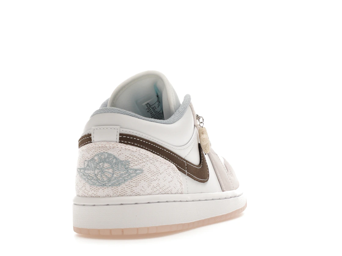Jordan 1 Low Coral (W)