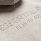 Fear of God Essentials S25 Hoodie Heather Stone ADONIO