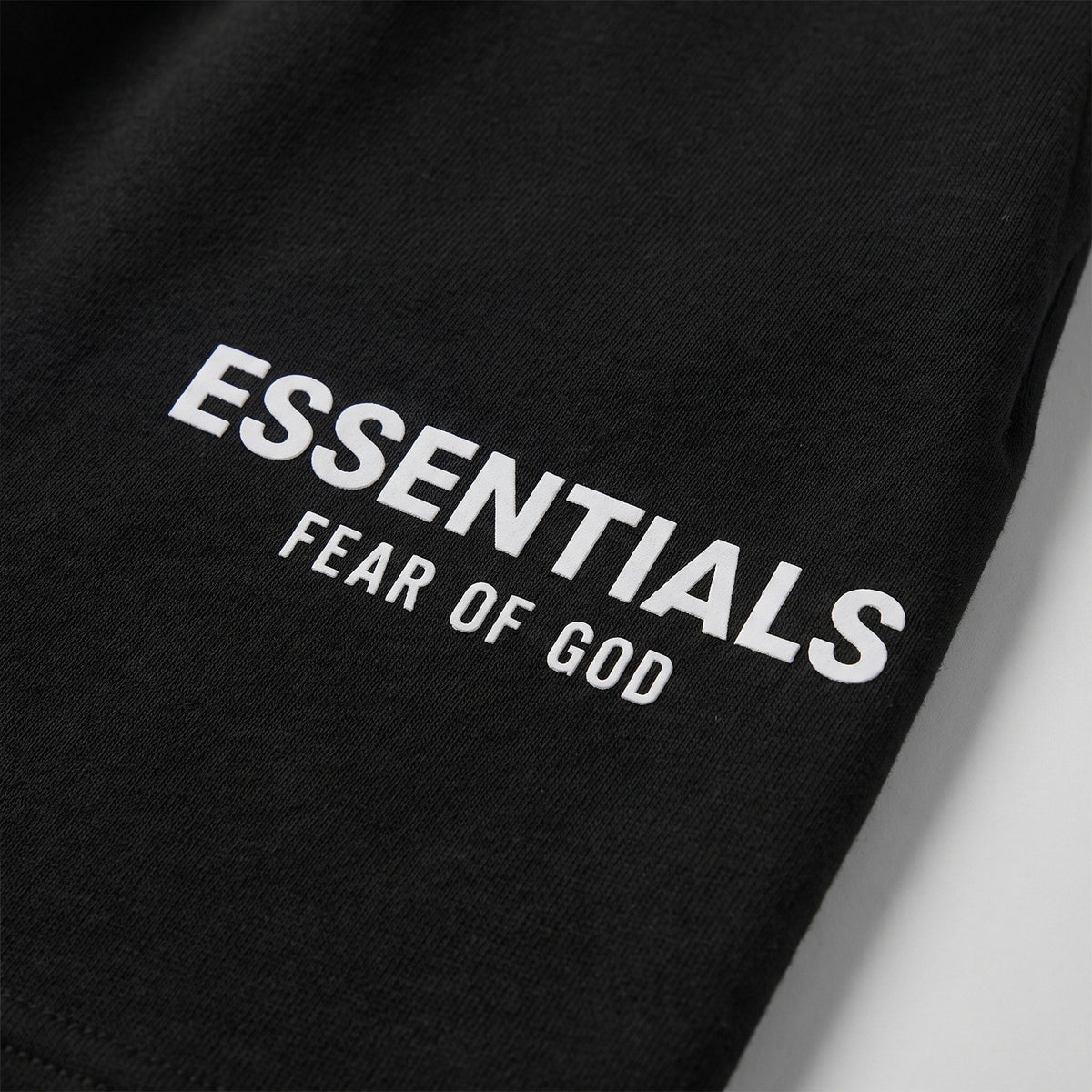 šortky Fear of God Essentials (S25) Shorts Jet Black ADONIO